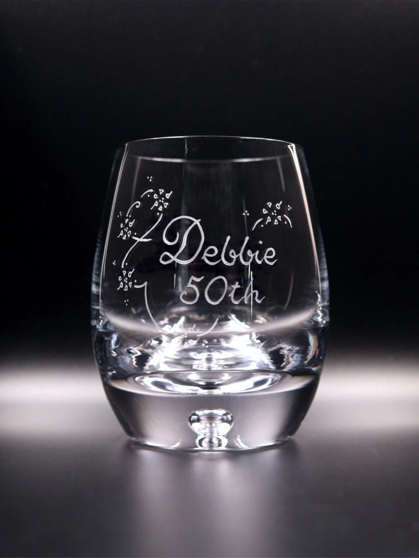 Bubble base whisky glass with elegant engraving. Girls Name, Number including decorative scroll and flowers.