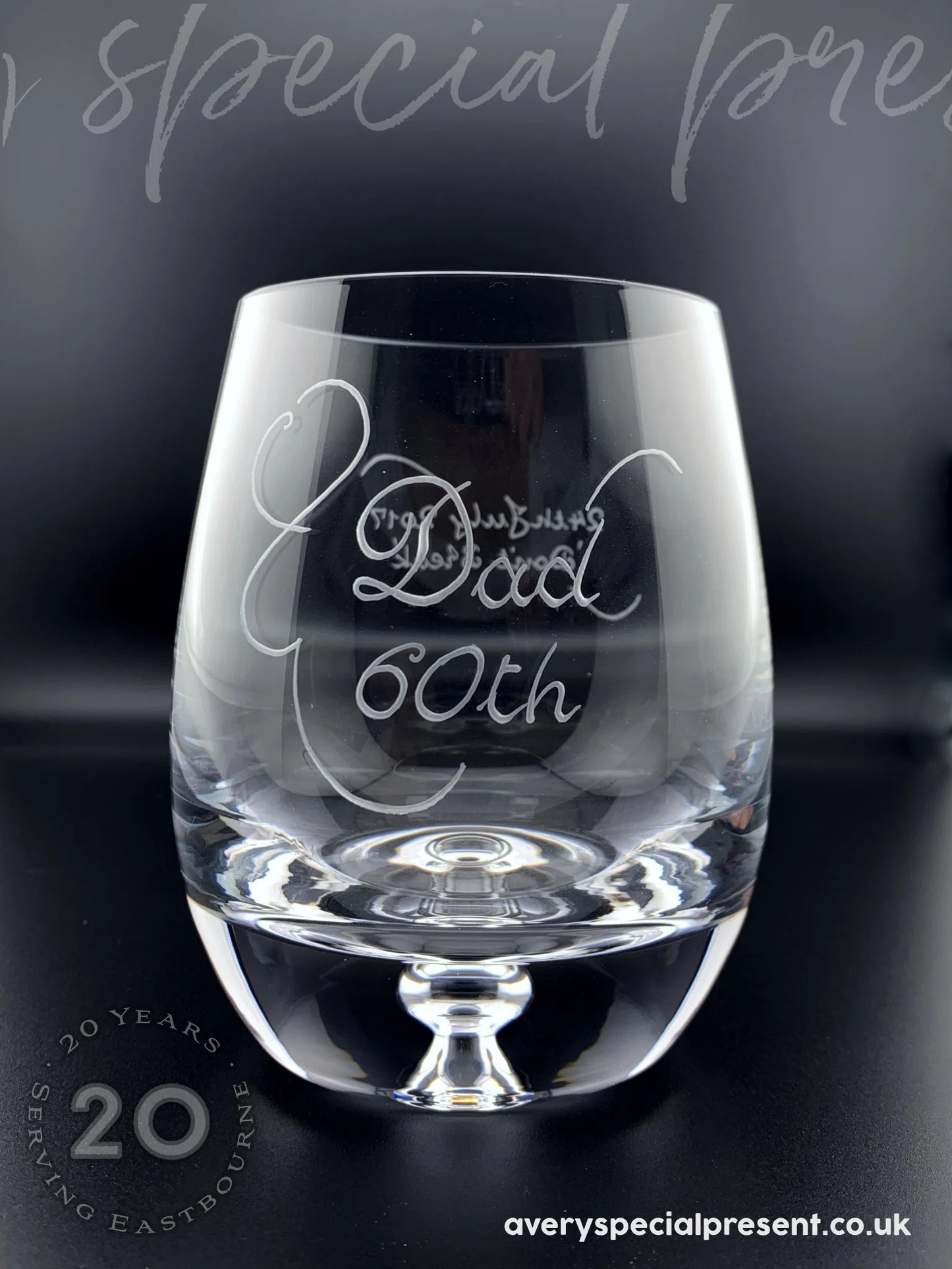 Bubble base whisky glass with elegant engraving. Name, Number, 2 Lines of hand engraving including a decorative scroll.
