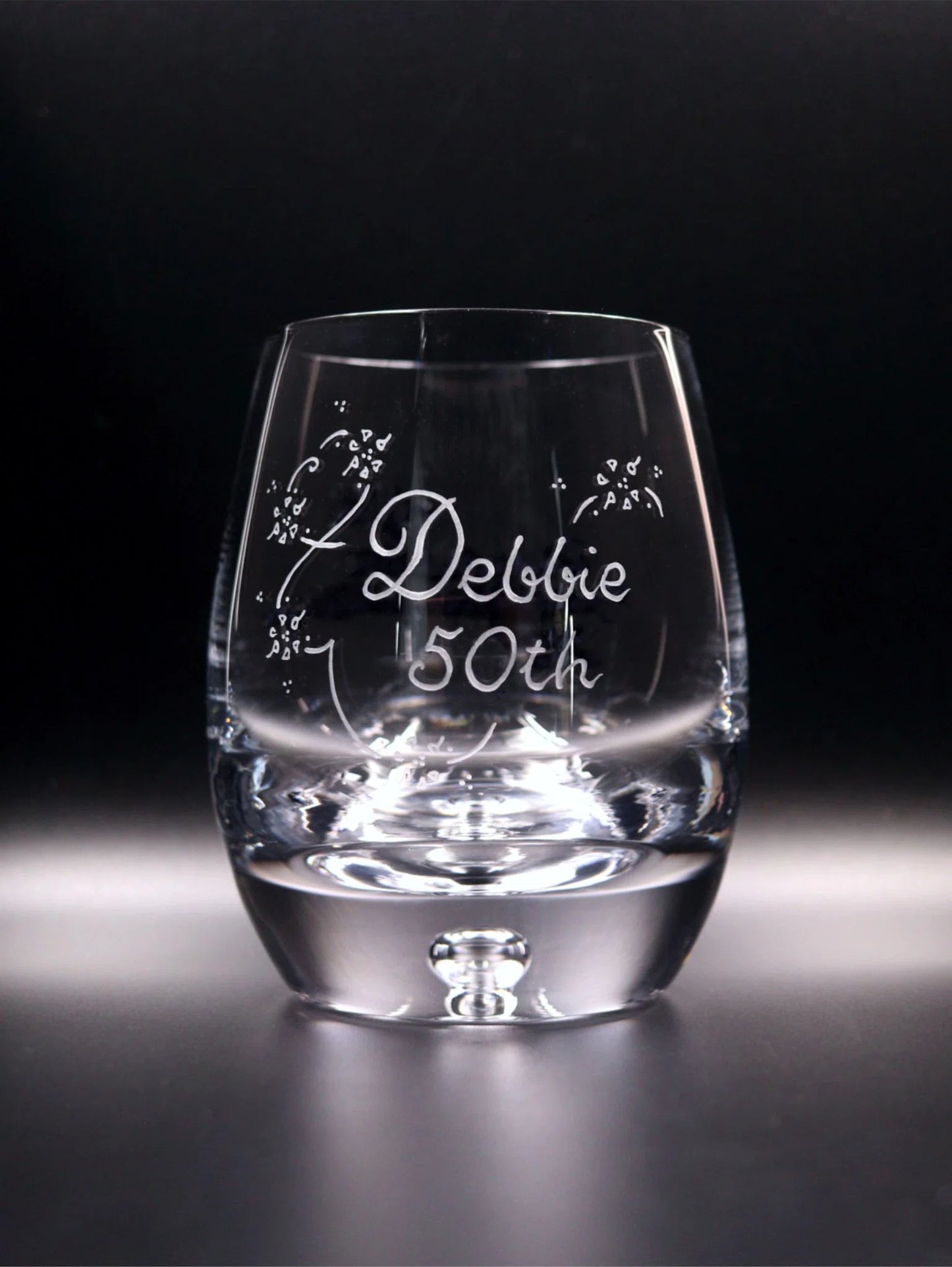 Bubble base whisky glass with elegant engraving. Girls Name, Number including decorative scroll and flowers. 