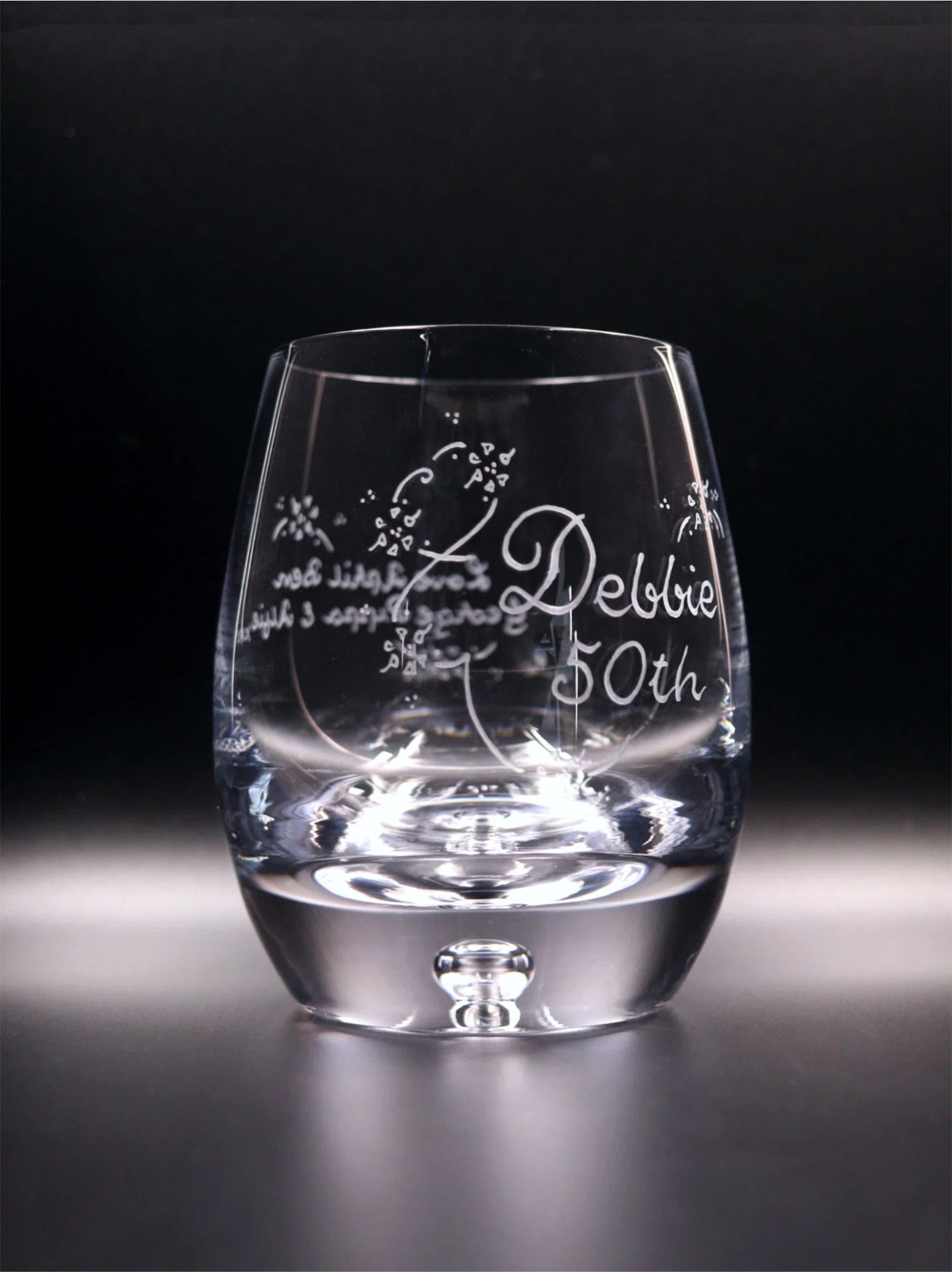 Bubble base whisky glass with elegant engraving. Girls Name, Number, 2 Lines of hand engraving including decorative scroll and flowers.  