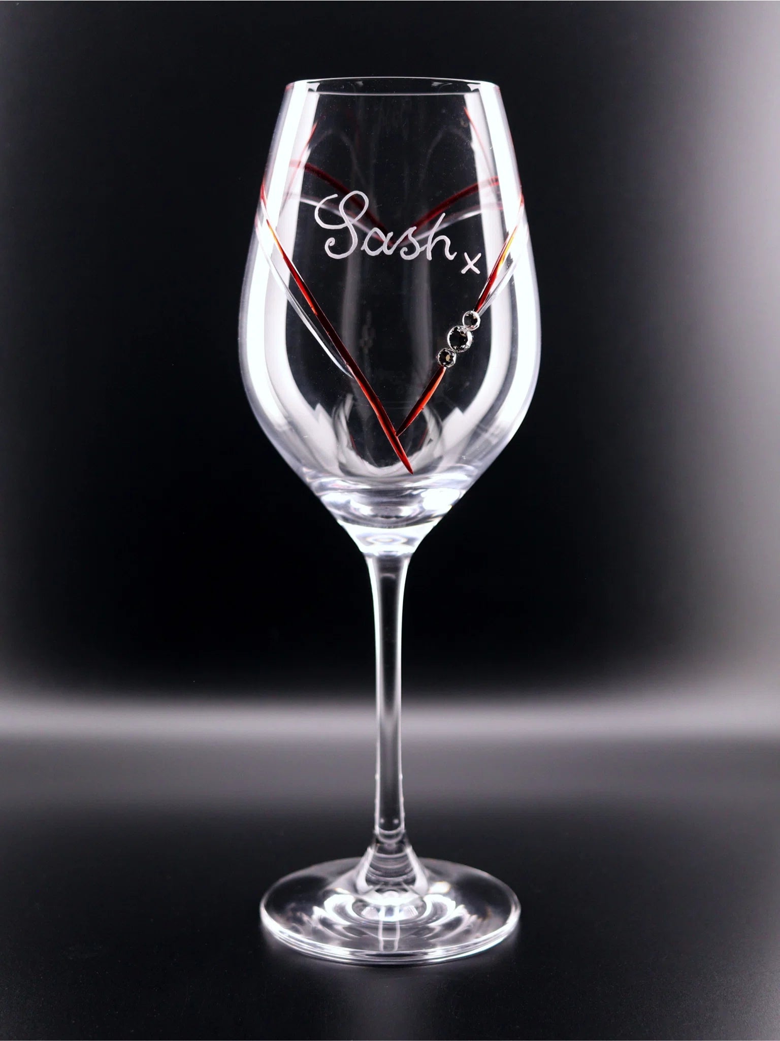 A glass with a heart cut into the glass inlaid in Red with Diamante Stones frames stylish hand engraved Sash x