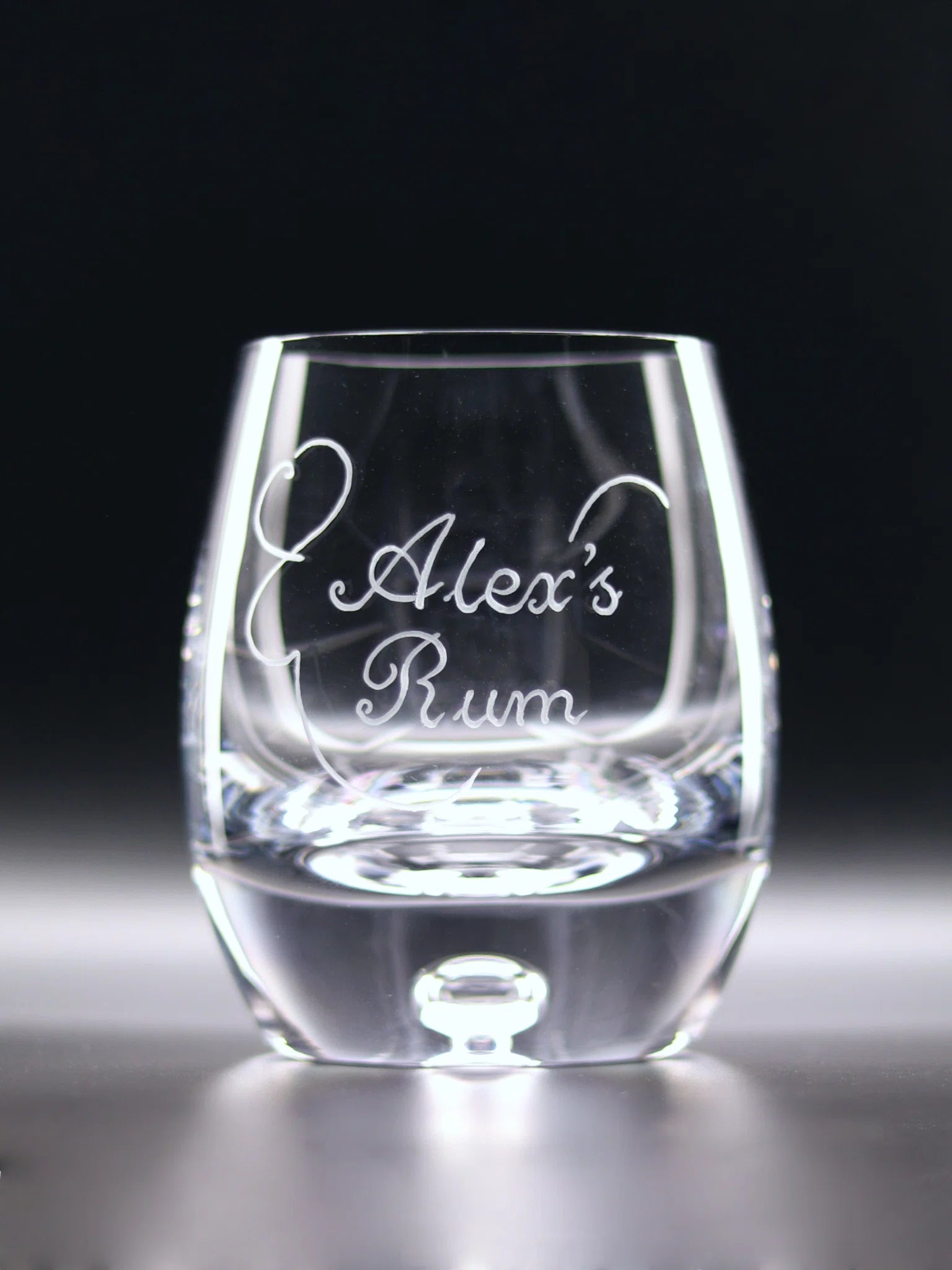 Bubble base whisky glass with elegant engraving. Name, Number/Feature Word hand engraved including decorative scroll. 