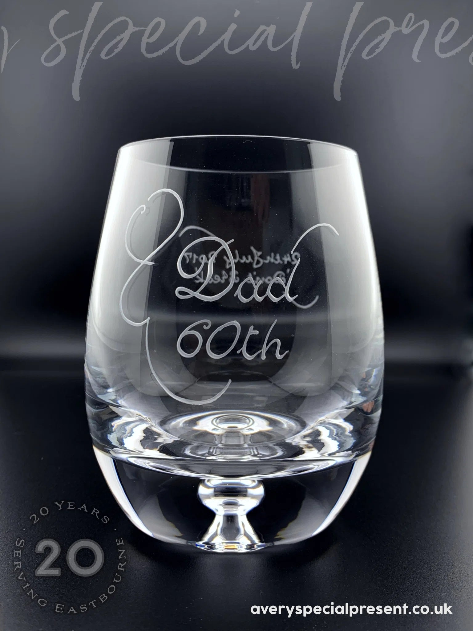 Bubble base whisky glass with elegant engraving. Name, Number, 2 Lines of hand engraving including a decorative scroll. 